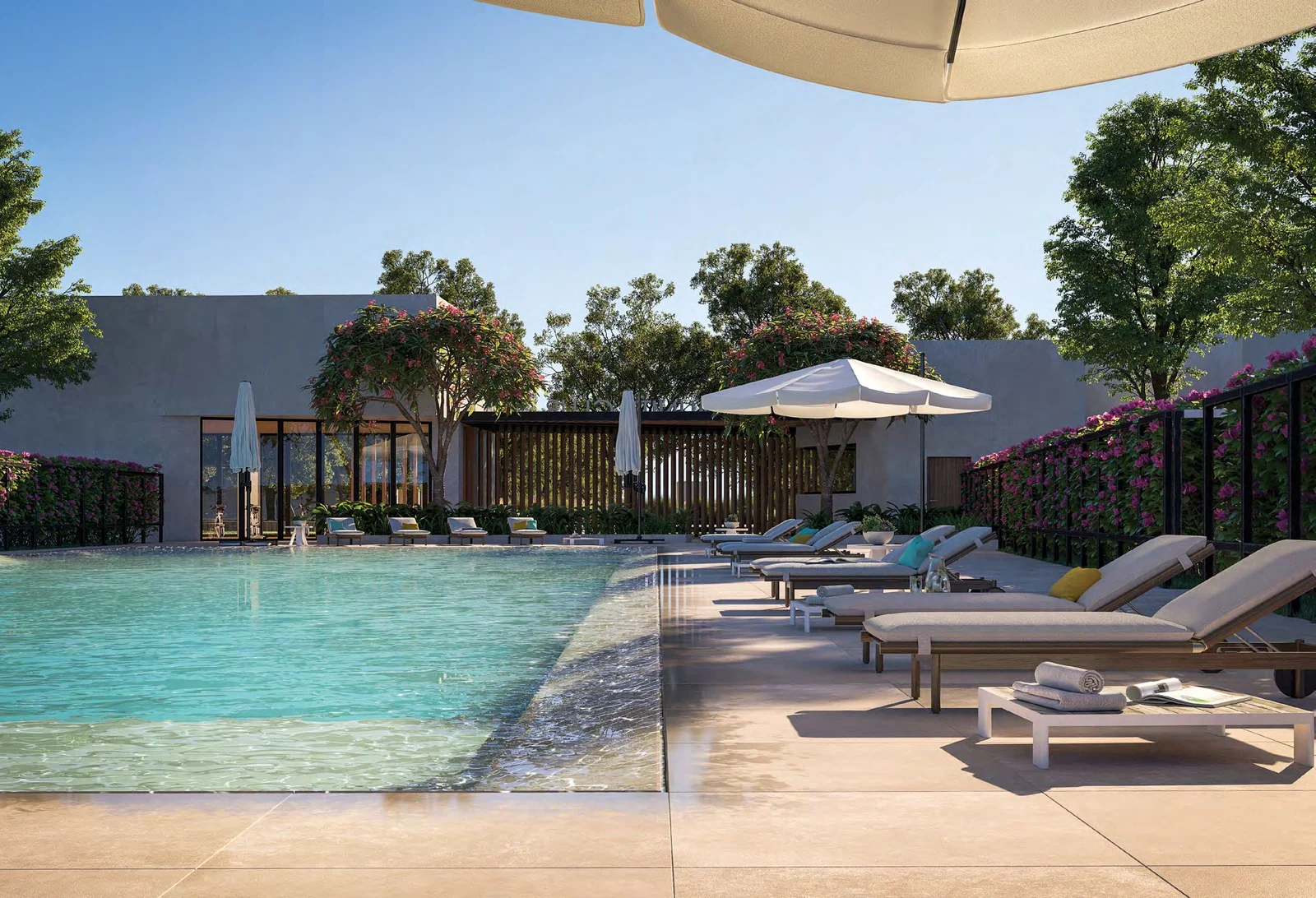 Resort-style amenities at Noya Luma including pools, splash pads, and landscaped parks