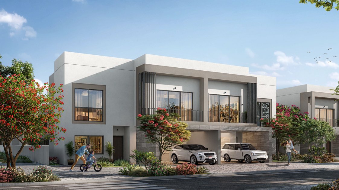 Spacious modern villa exterior at The Dahlias with private garden and driveway